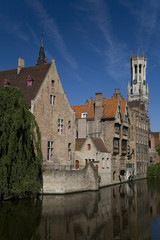 Fototapeta premium Rozenhoedkaai showing Rosaire Quay and the Belfry tower.