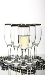 Wine goblets on mirror table