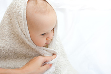 baby portrait with towel