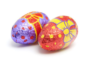 chocolate easter eggs over white background
