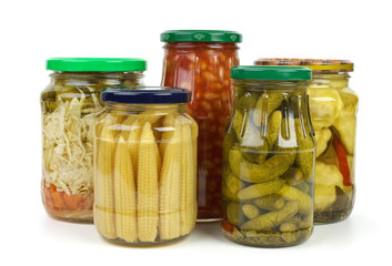 Glass jars with marinated vegetables