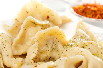 Ravioli with spicy herbs and butter