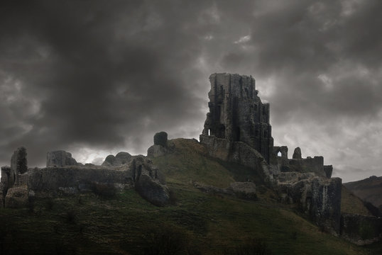Storm above castle ruins