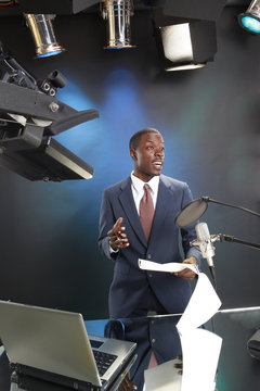 TV/Radio News Anchor With Prompter And Microphone