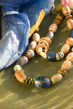 Wood And Seashell Bead Necklaces Close Up