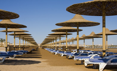 Beach on a sunny day. Hurghada city in Egypt.