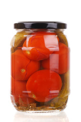 The clear glass jar of colorful pickled vegetables