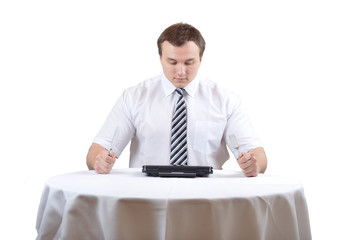 Man is preparing eat a notebook for lunch