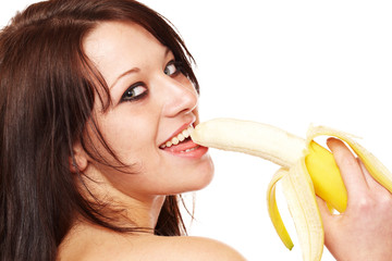 Frau leckt an Banane
