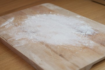 A lightly floured chopping board