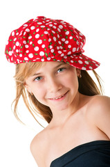 Girl boy in a red cap.