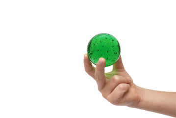 Hand with green sphere isolated on the white background