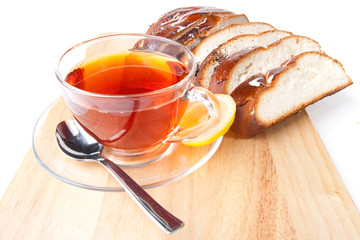 Fresh bun and cup of tea