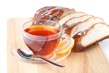 Fresh bun and cup of tea