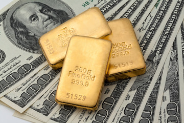 Investing in real gold than gold bullion and gold coins © Gina Sanders