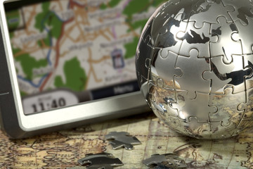 Car navigator on the old map.