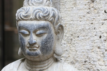 Fototapeta premium Buddha aus Stein - Stone Buddha
