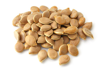 Pumpkin seeds on a white background