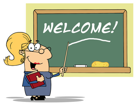 Blond Lady School Teacher Pointing To Welcome On A Chalkboard