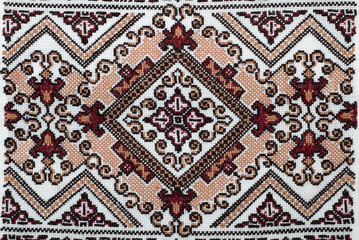 embroidered handmade good by cross-stitch pattern