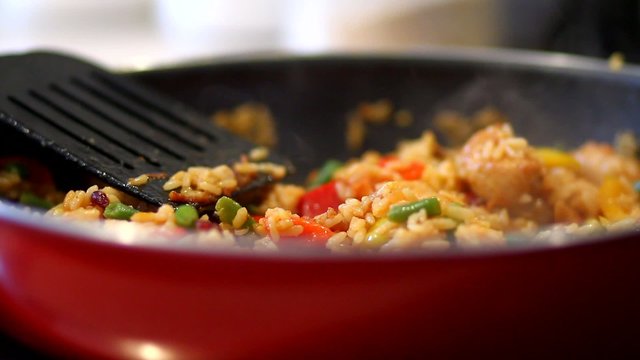 Cooking Mexican food on hot frying pan