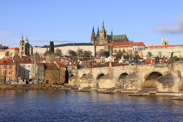 Fototapeta na wymiar The colorful Prague gothic Castle with the Charles Bridge