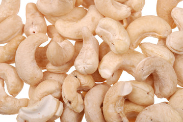 Pile of roasted cashew nuts isolated
