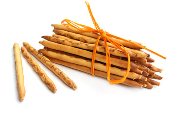 Sheaf of pretzels ( breadsticks ) on white