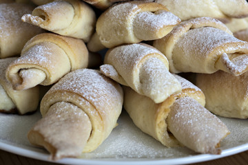 Home made crescent rolls stuffed with plum jam