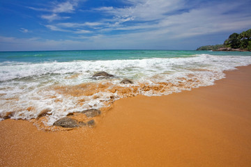 Tropical beach under blue sky. Thailand