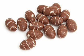 chocolate easter eggs over white background