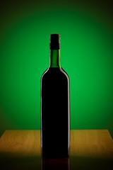 Wine against colour gradient background