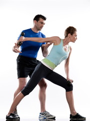 Fototapeta na wymiar couple doing workout Lunges.Triceps Extension