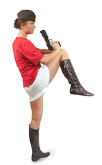 young woman posing in garrison cap with gun