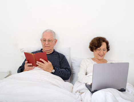 senior couple in bed