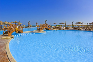 Swimming pool at luxury tropical resort