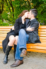 young loving couple in park