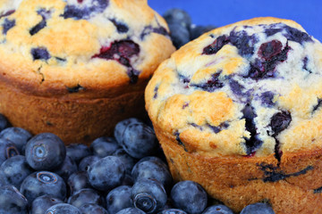 Extreme close up of fresh baked blueberry muffins and blueberrie