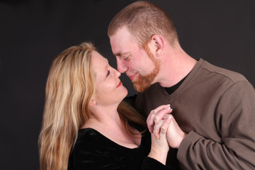 Couple holding hands