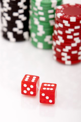 Colorful poker chips and dices