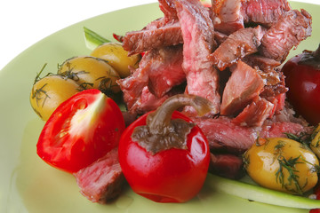 beef meat slices on green