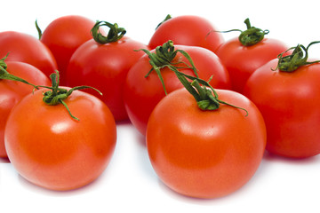 red tomatoes isolated on white