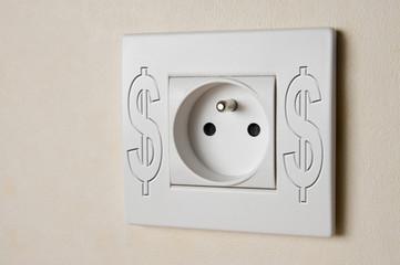 close-up of white electric socket with dollar symbol