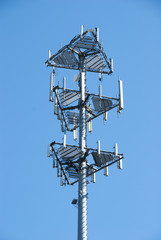Cell tower on blue sky