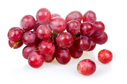Bunch of ripe pink grapes isolated