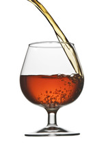 pouring cognac brandy isolated