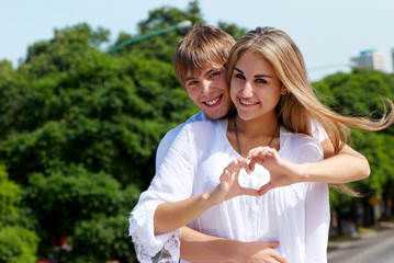 Young couple against the nature