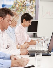 Fototapeta premium Businessman making notes