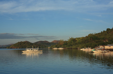 Fototapeta premium Boat in tropical bay