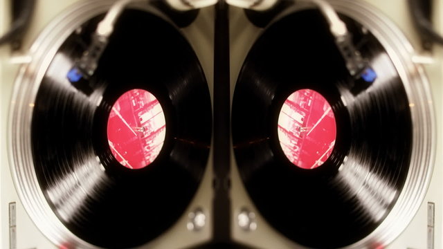 a pan across dj turntables